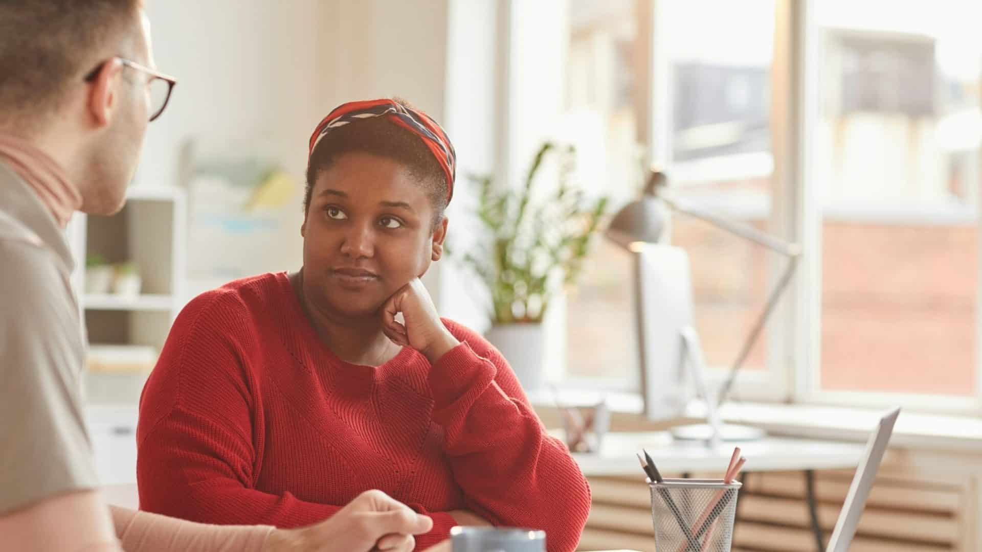 Woman looking at the man