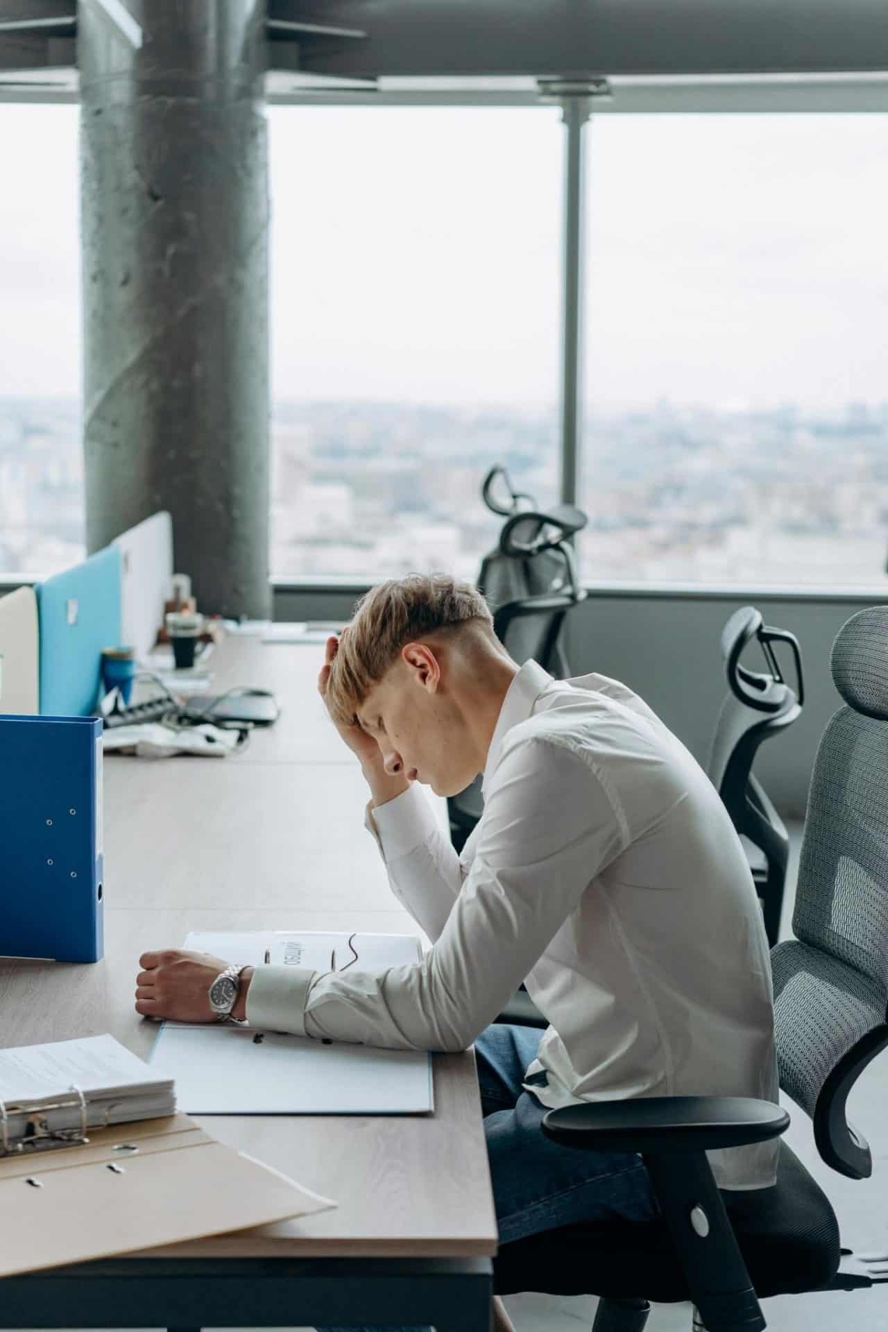 A man stressed at work.