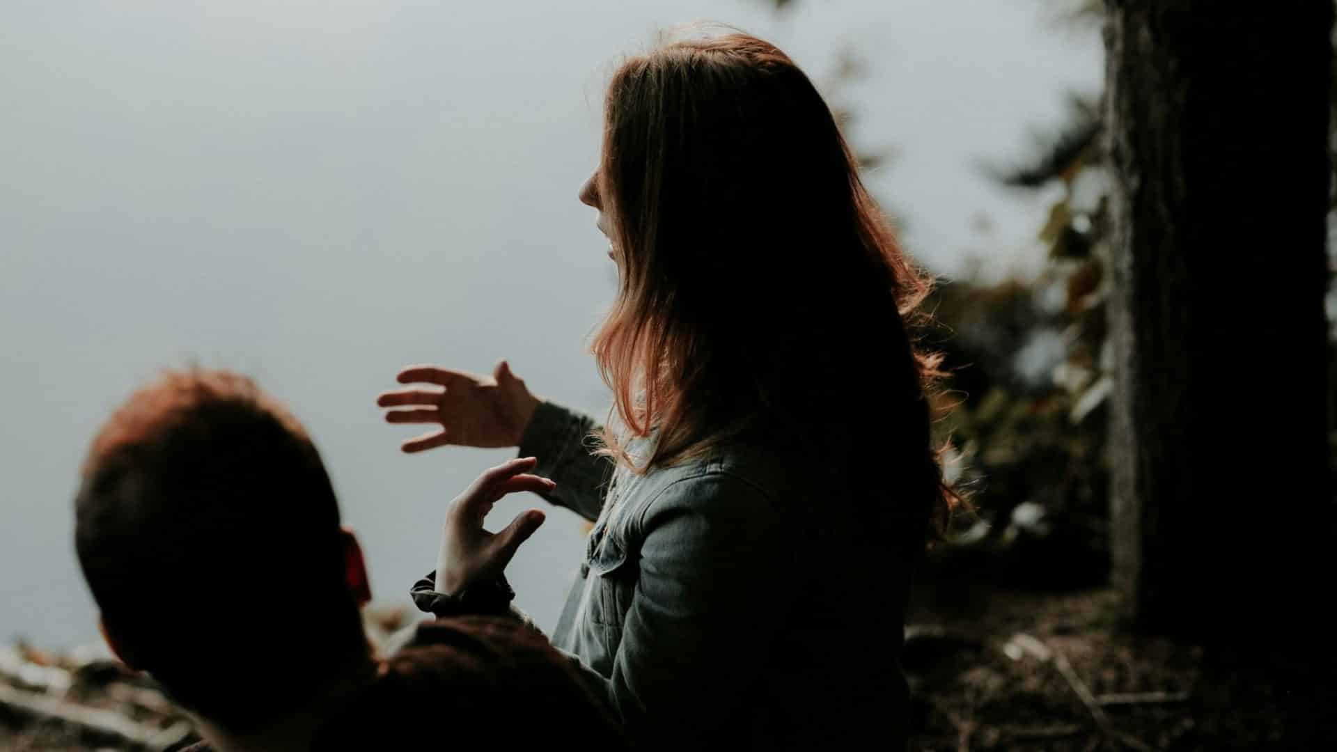 A man and woman talking