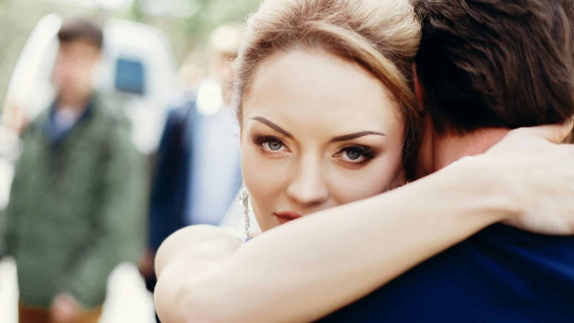 Woman hugging a man