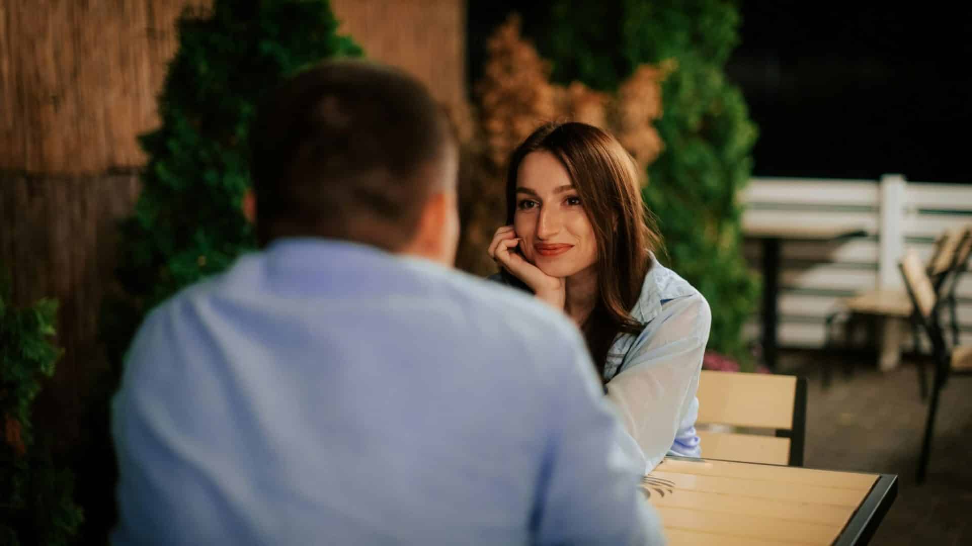 Woman looking at the man