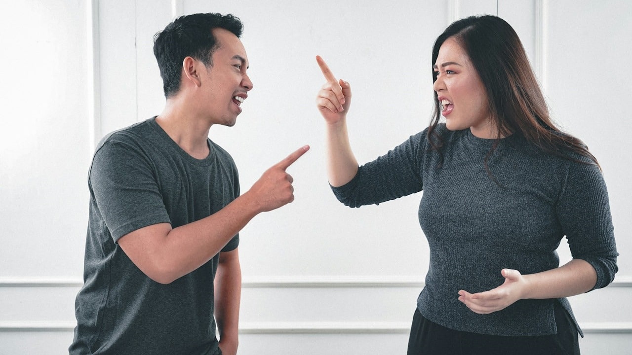 A couple arguing.