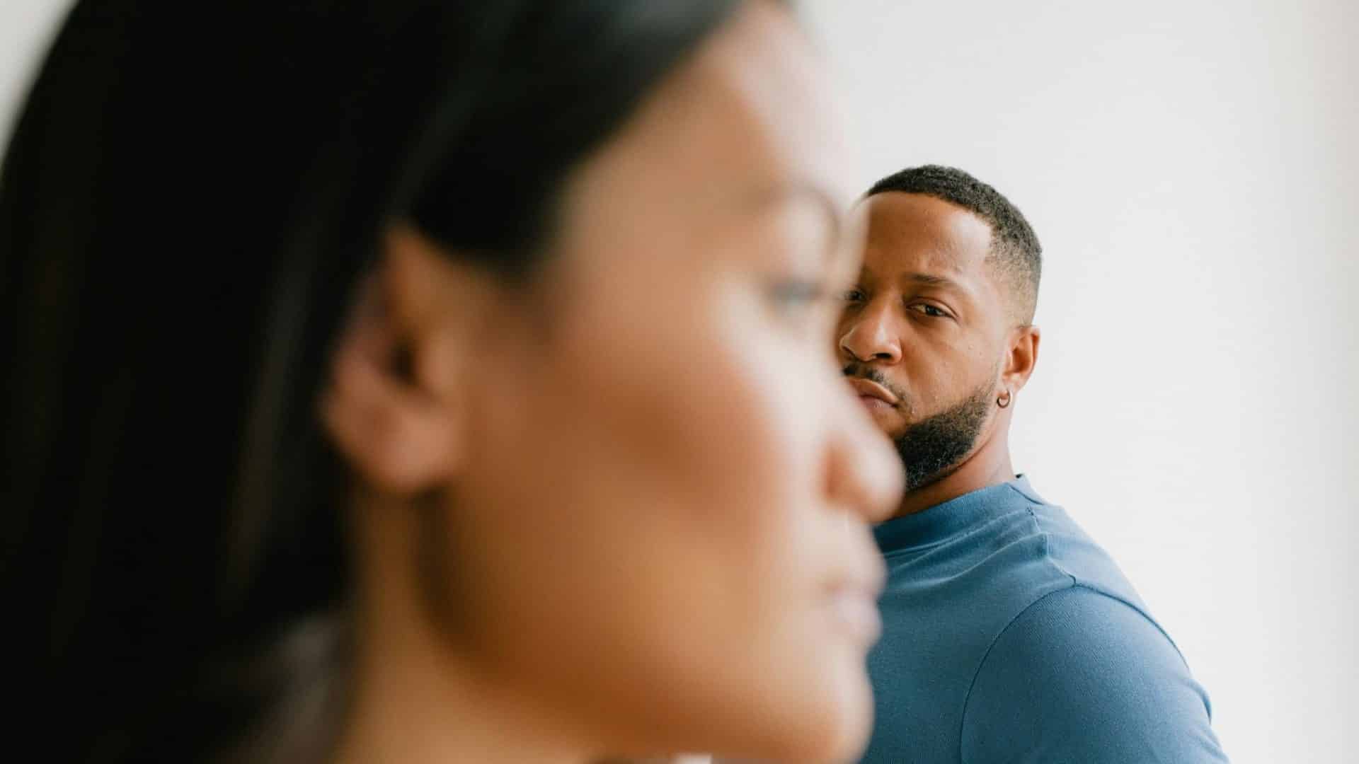 A man looking at the woman