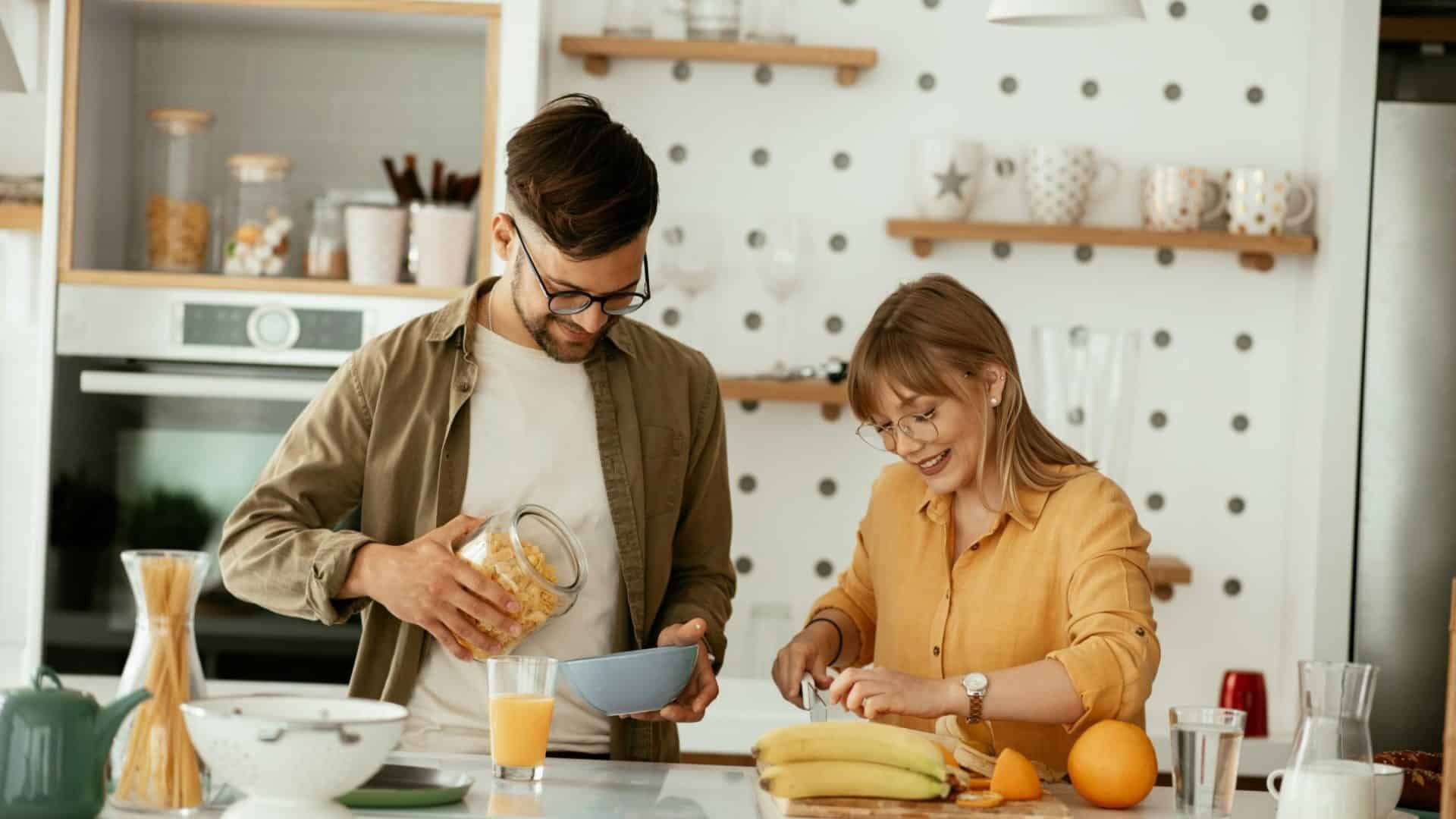 A man and woman at the kitchen
