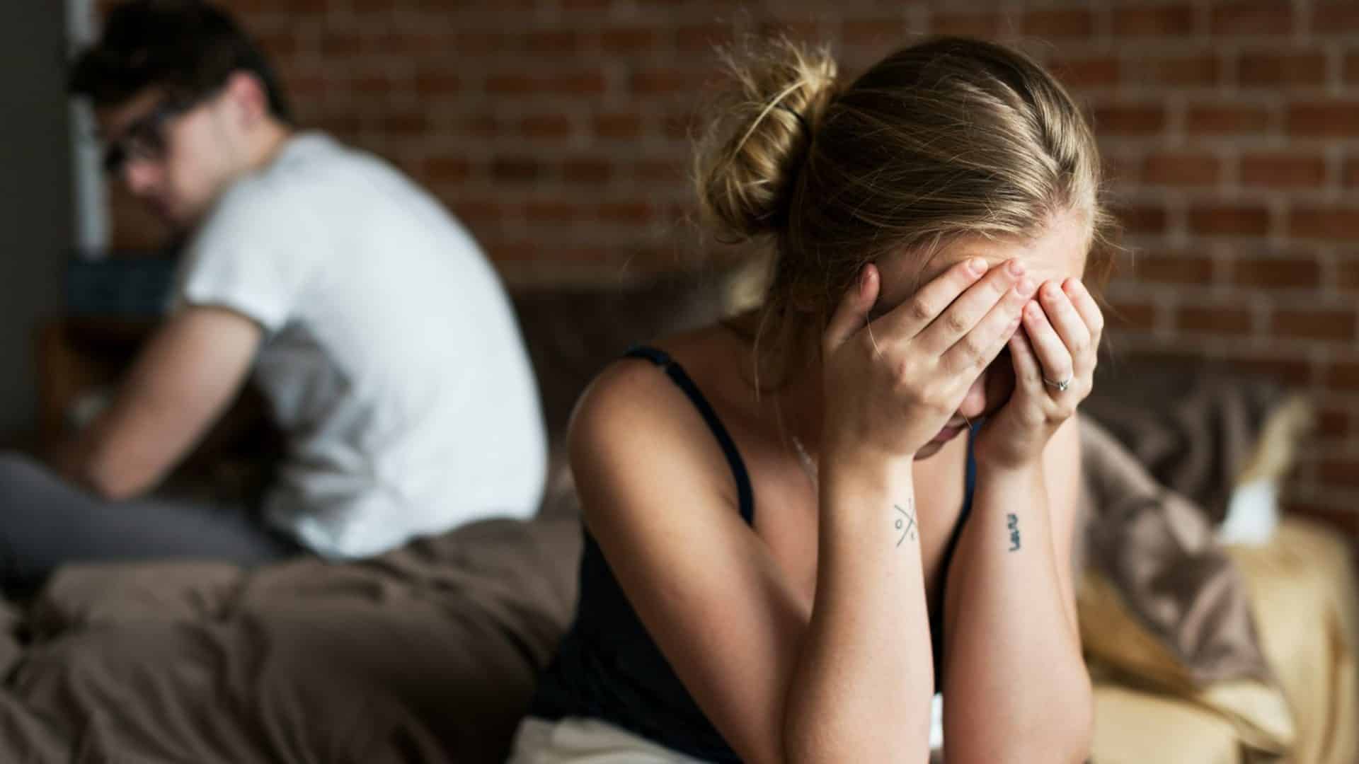 Woman covering her face