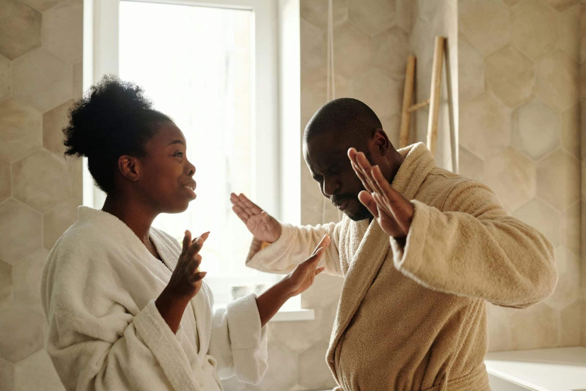 A man stopping a woman to talk