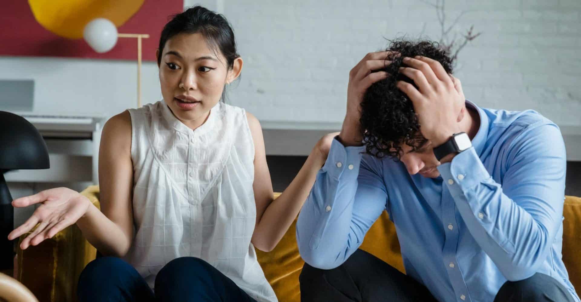 A couple experiencing tension during a conversation.