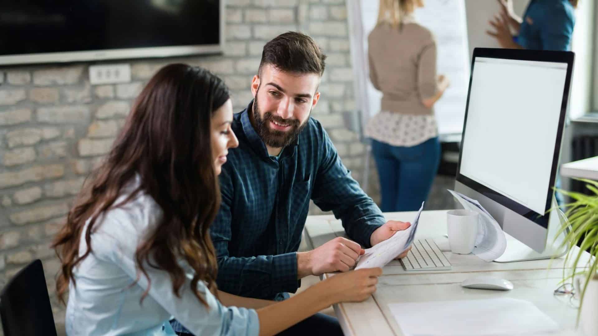 A man and woman at the office