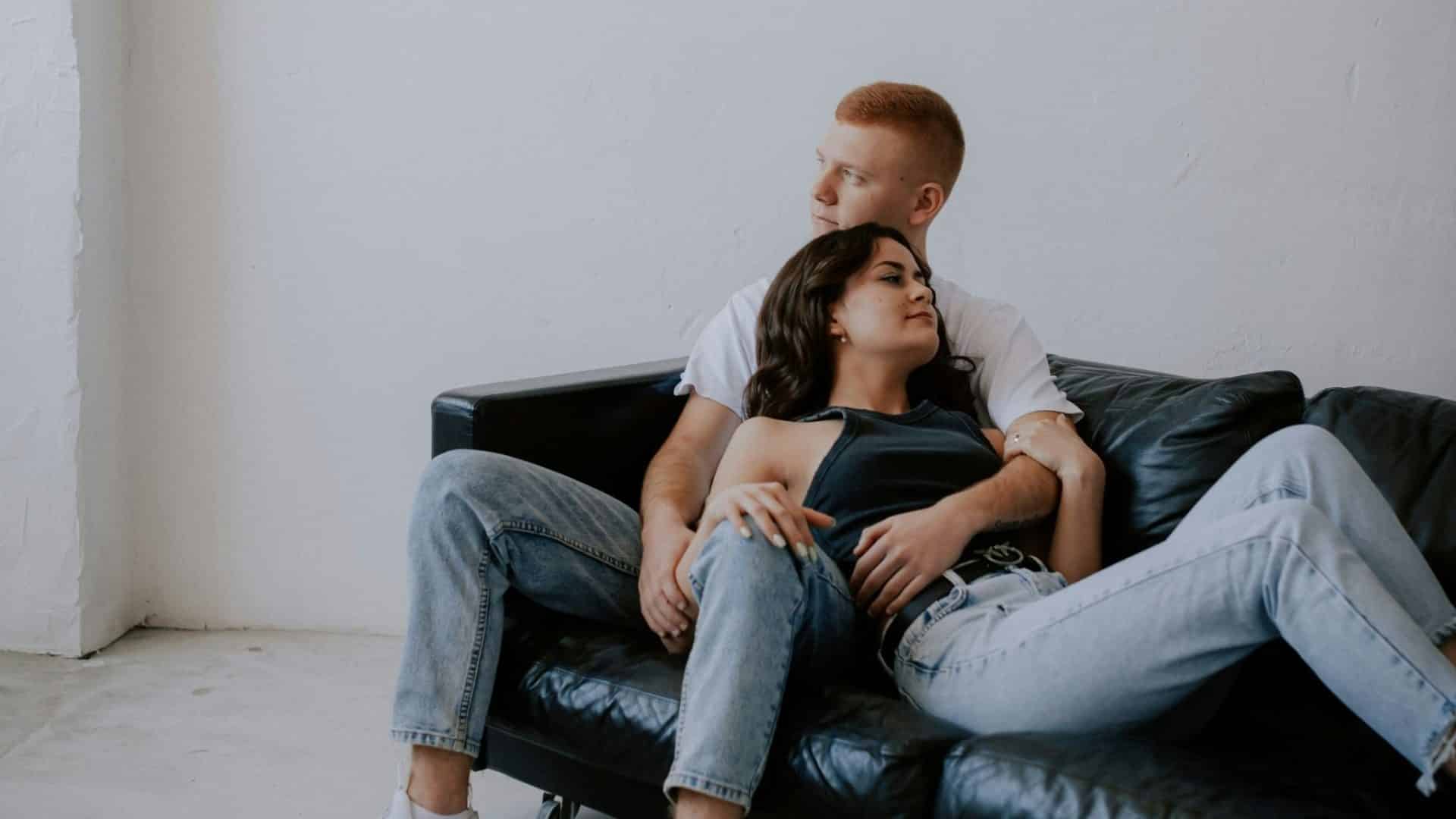 A man and woman at the couch