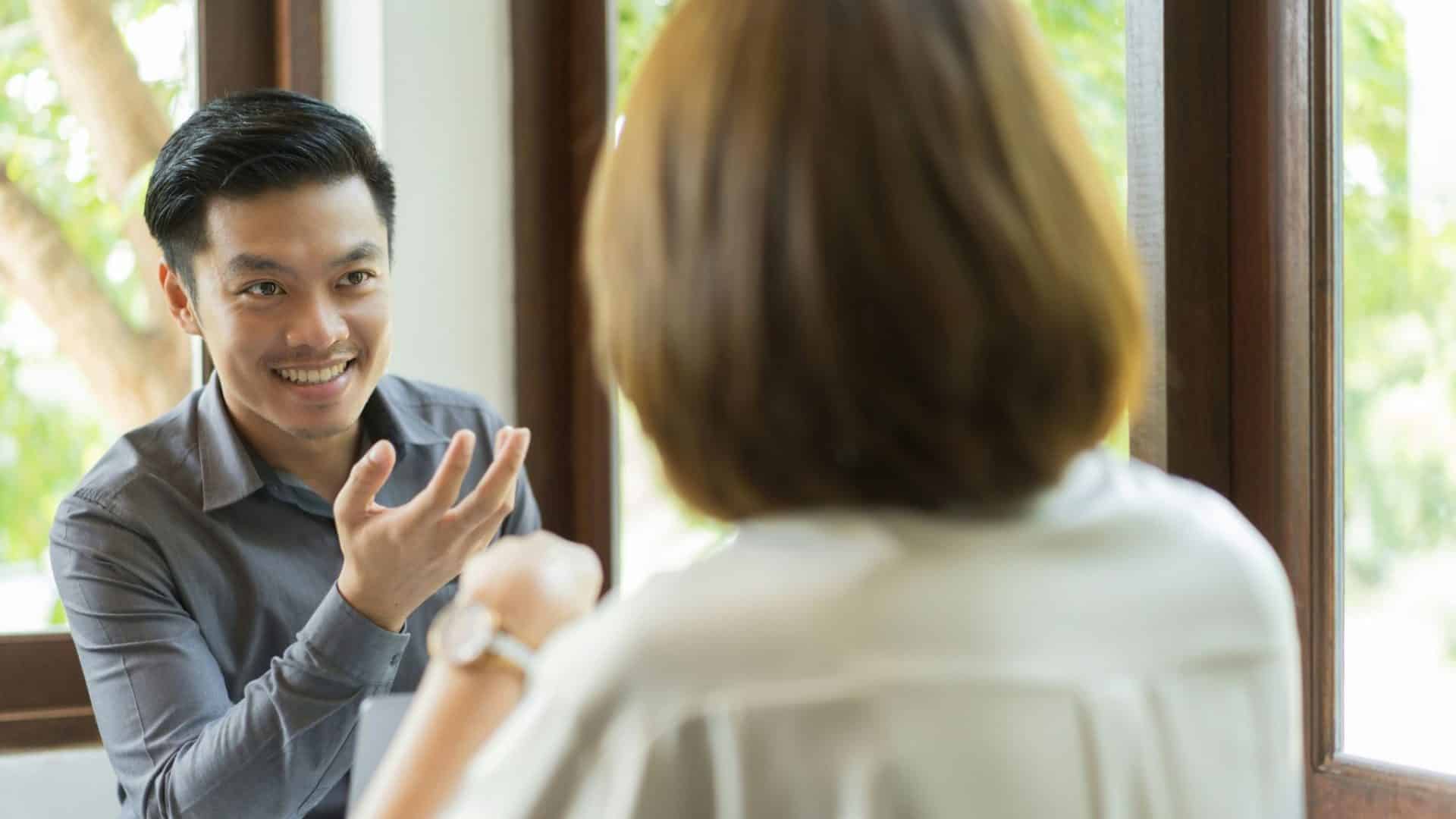A man and woman talking