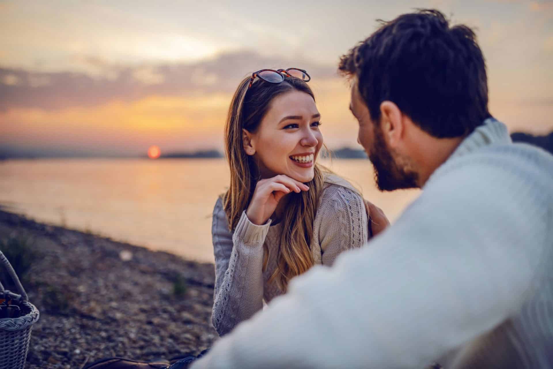 A woman smiling at her boyfriend