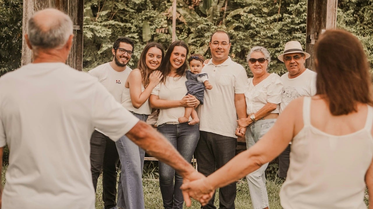 An extended family standing together.