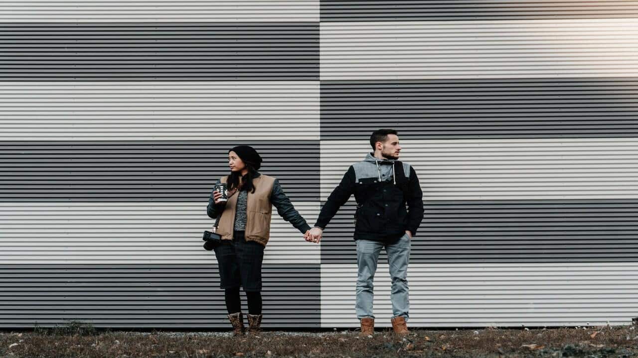 A couple not looking at each other