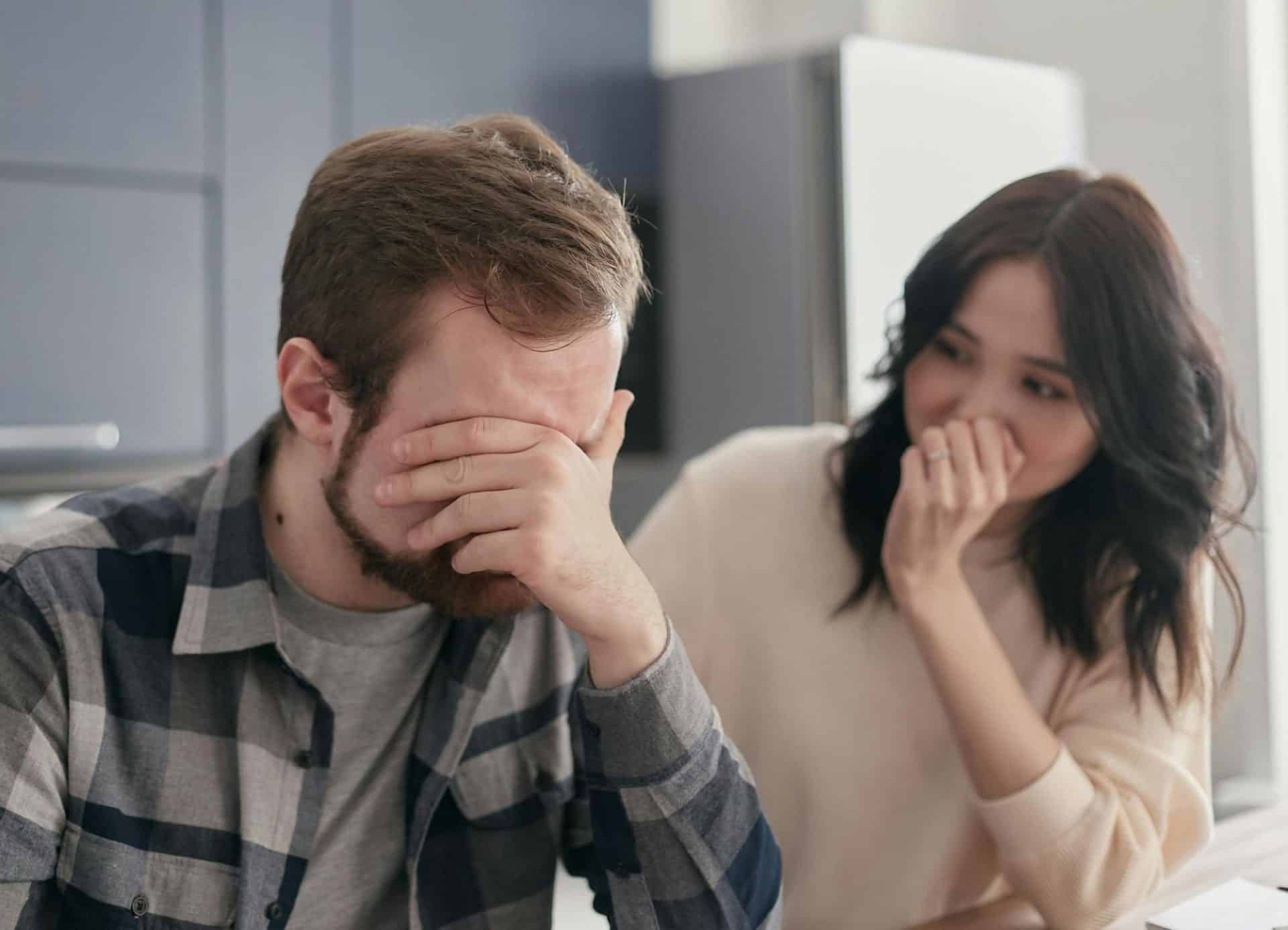 Man struggling to express emotions during conversation