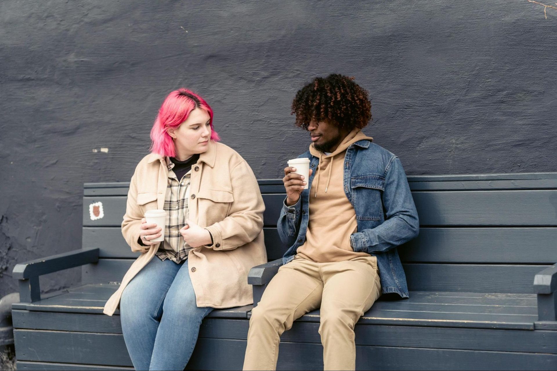 Woman ignoring her phone notifications while spending time with a man
