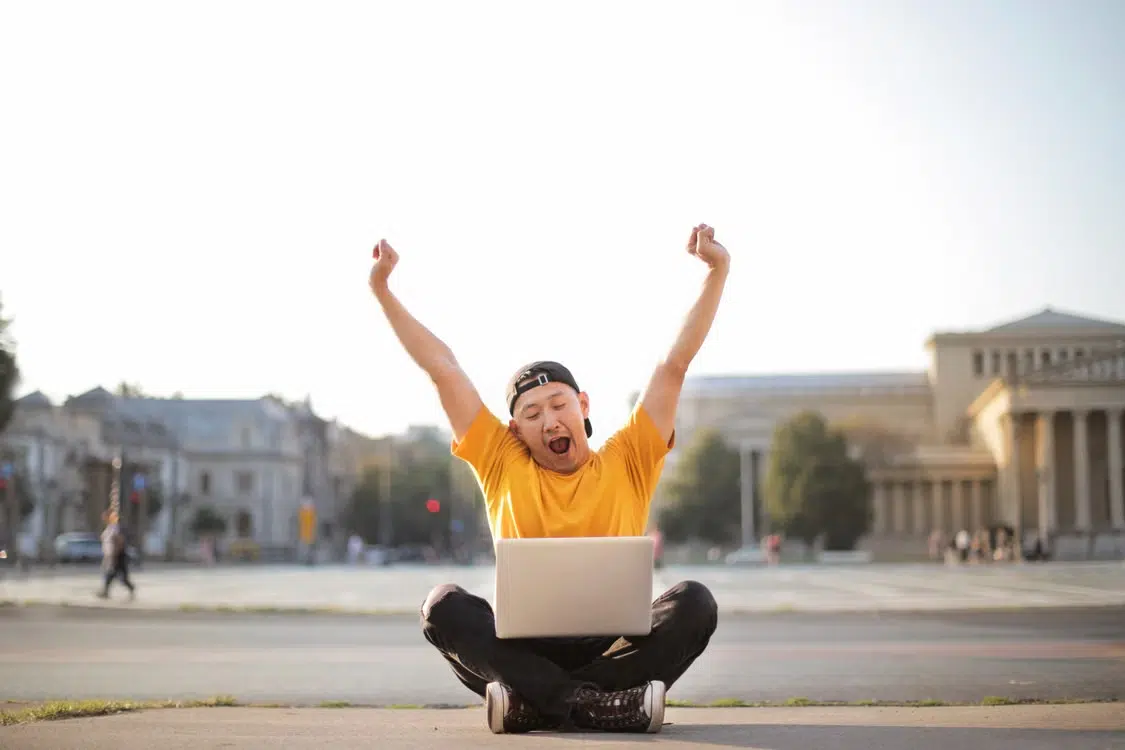 A man celebrating overcoming a challenge.