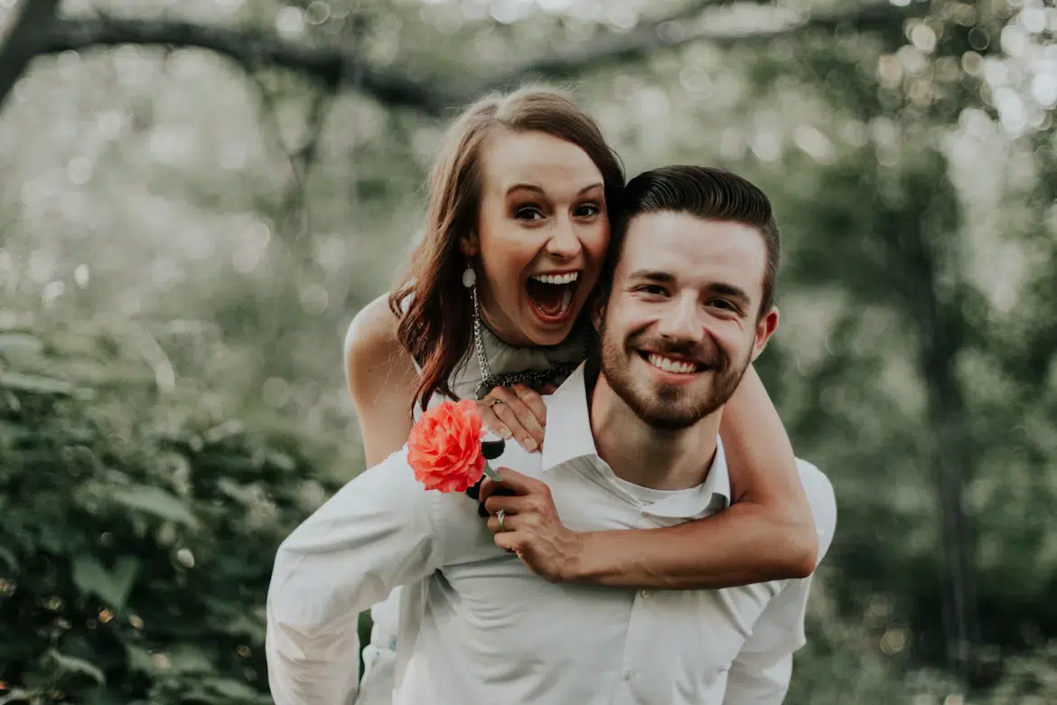 A couple laughing and cuddling.