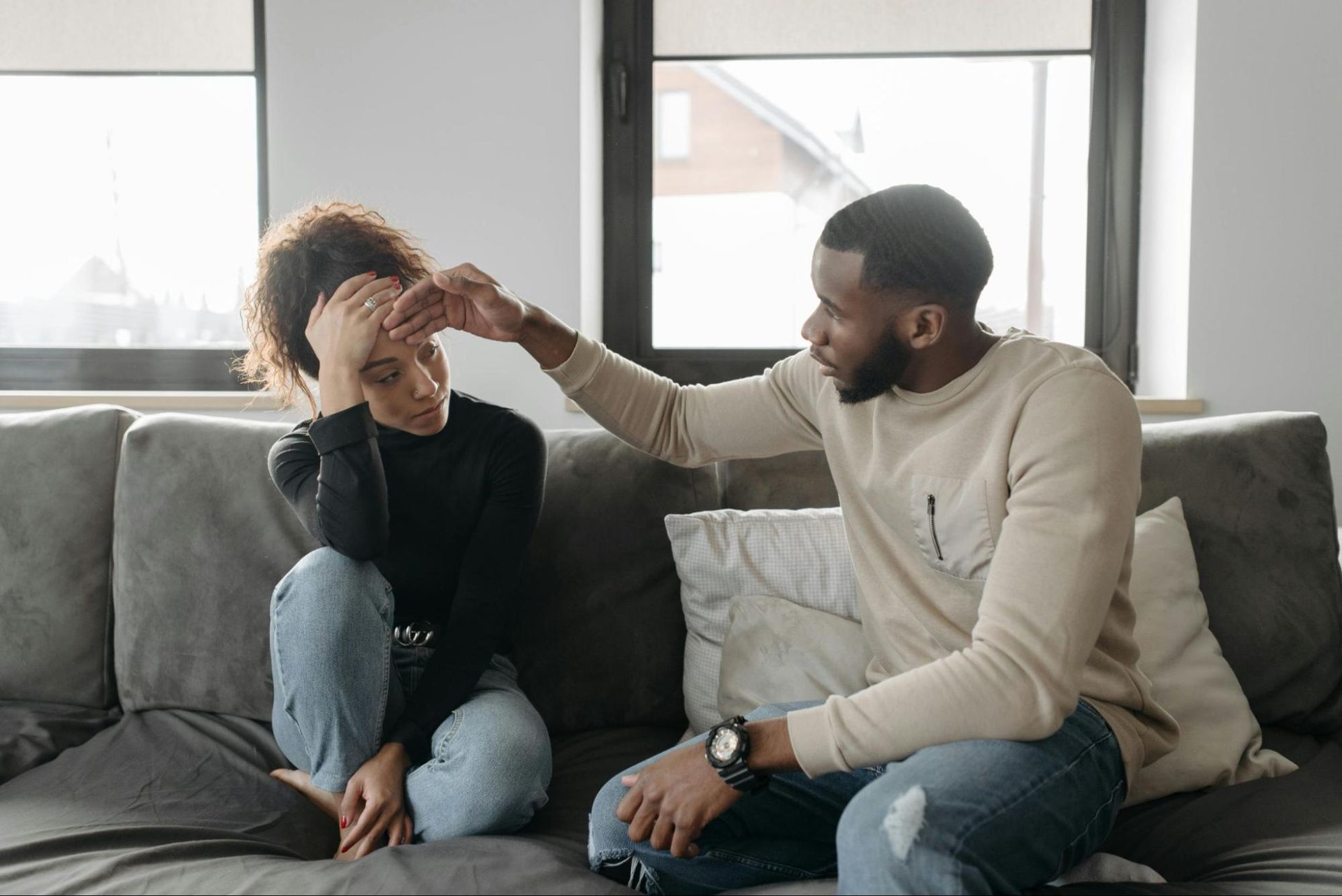 Woman staying calm while a man makes a small mistake at home