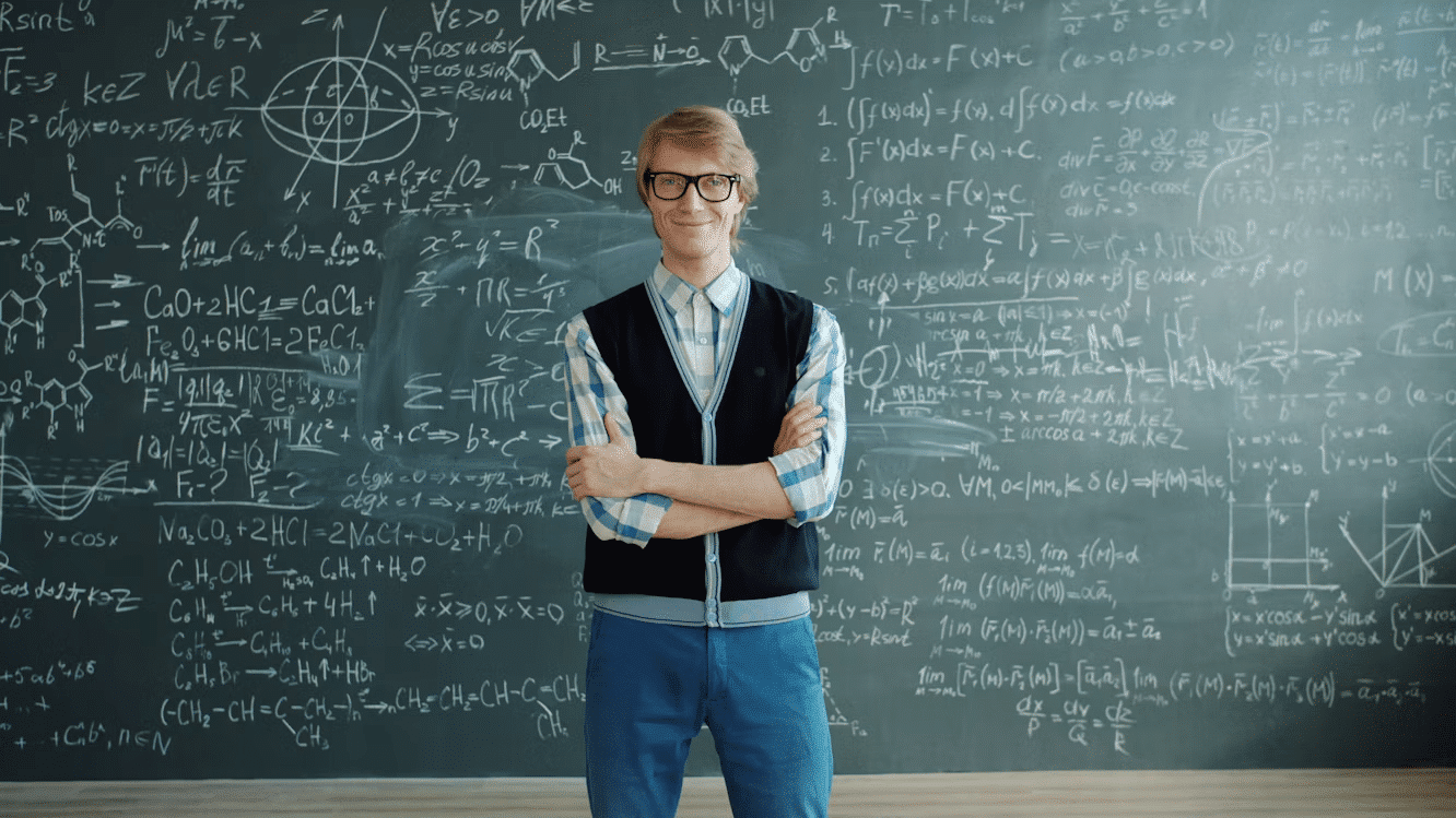 A science genius standing in front of the white board.