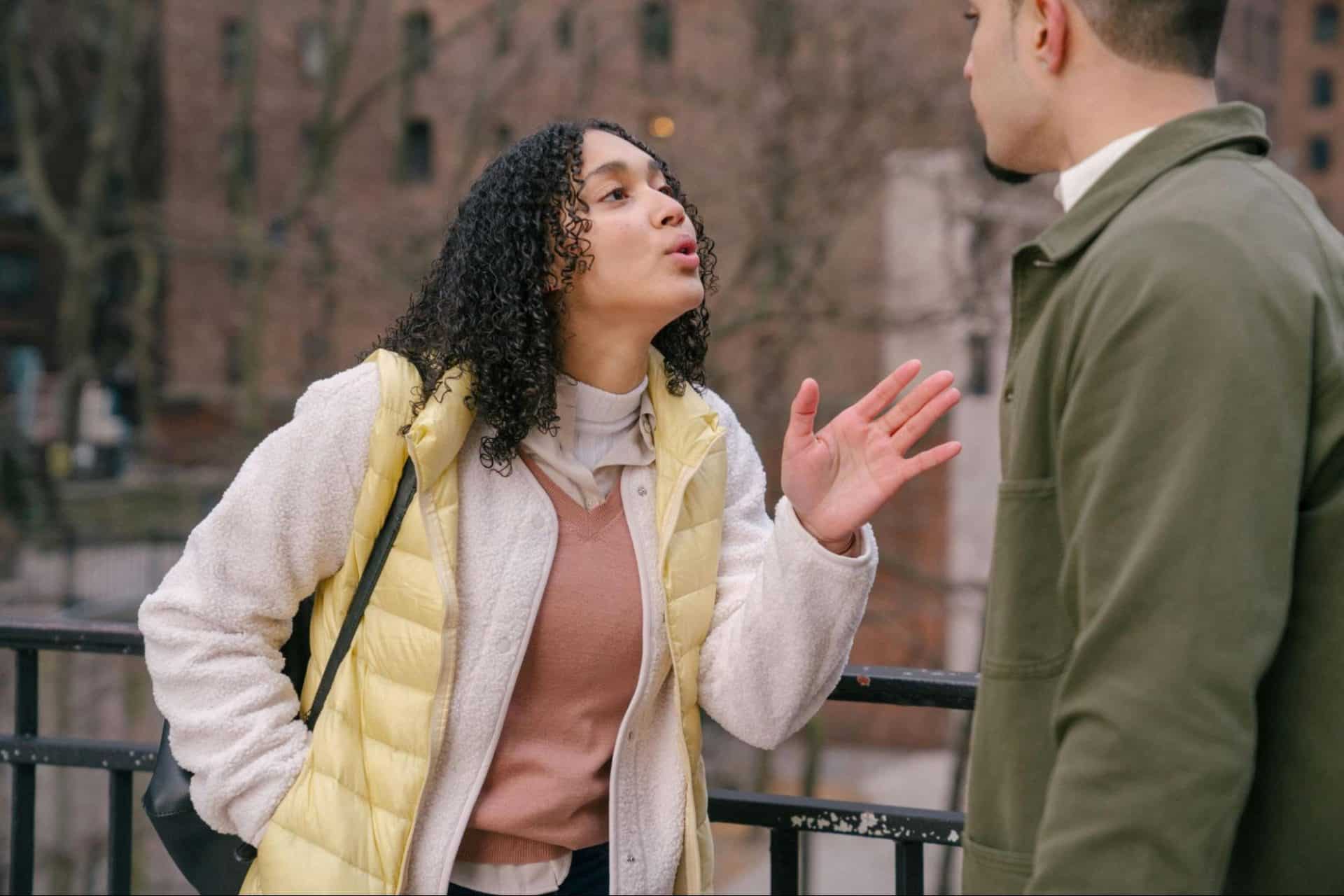 Woman confidently expressing disagreement in a calm conversation