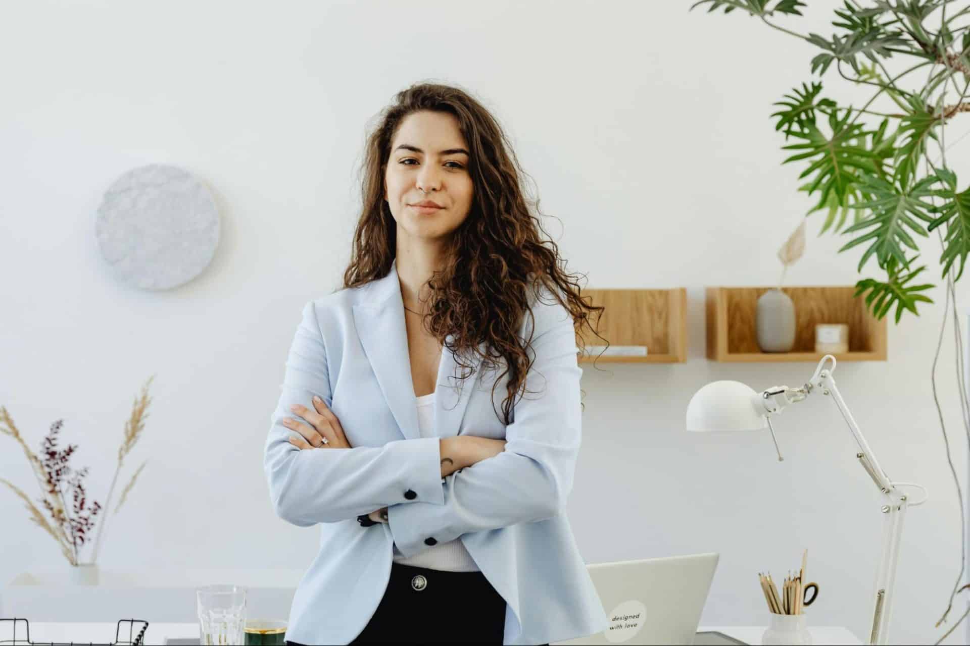 Confident woman standing independently with calm and self-assured expression