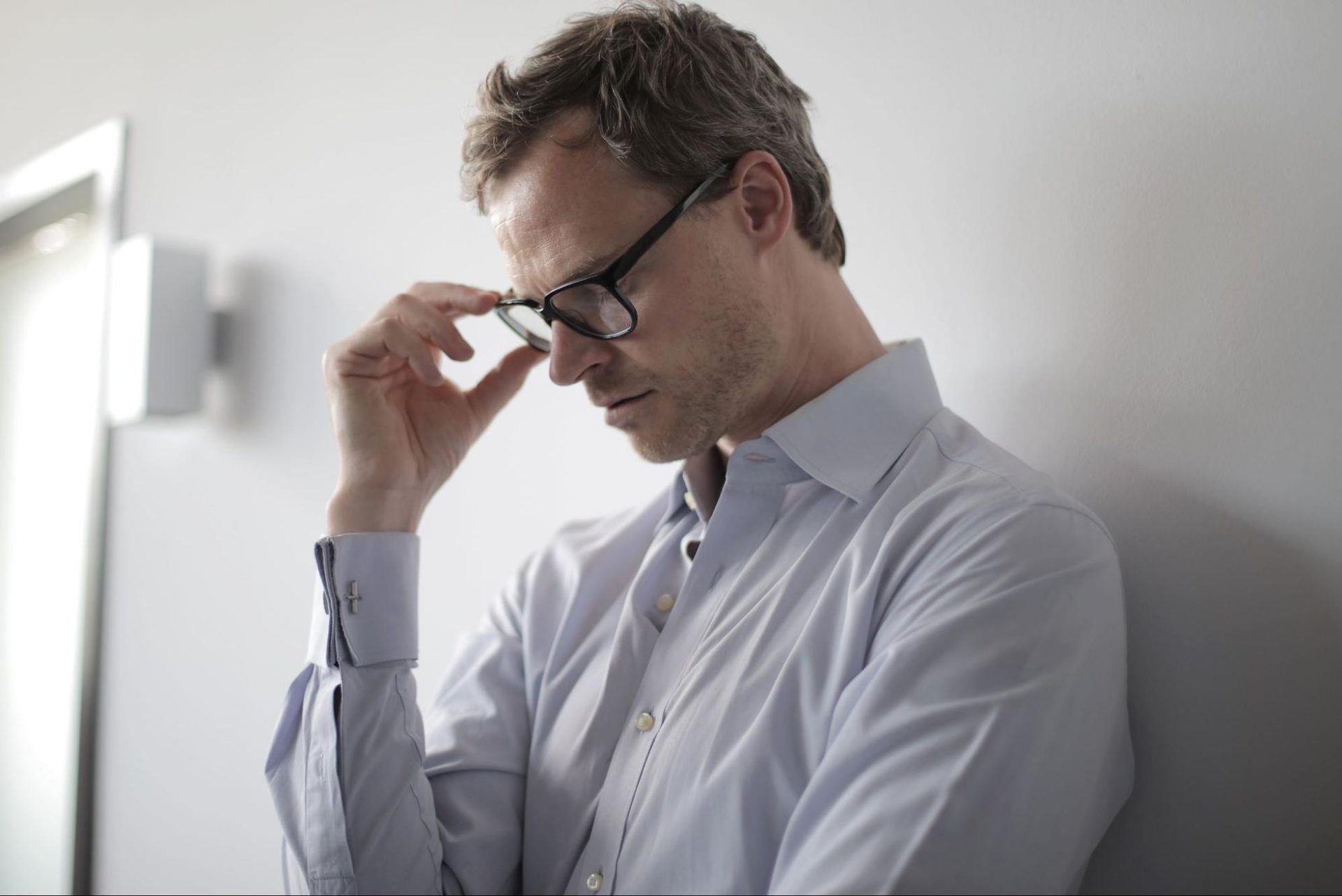 A man looks calm under pressure as he thinks of a solution.