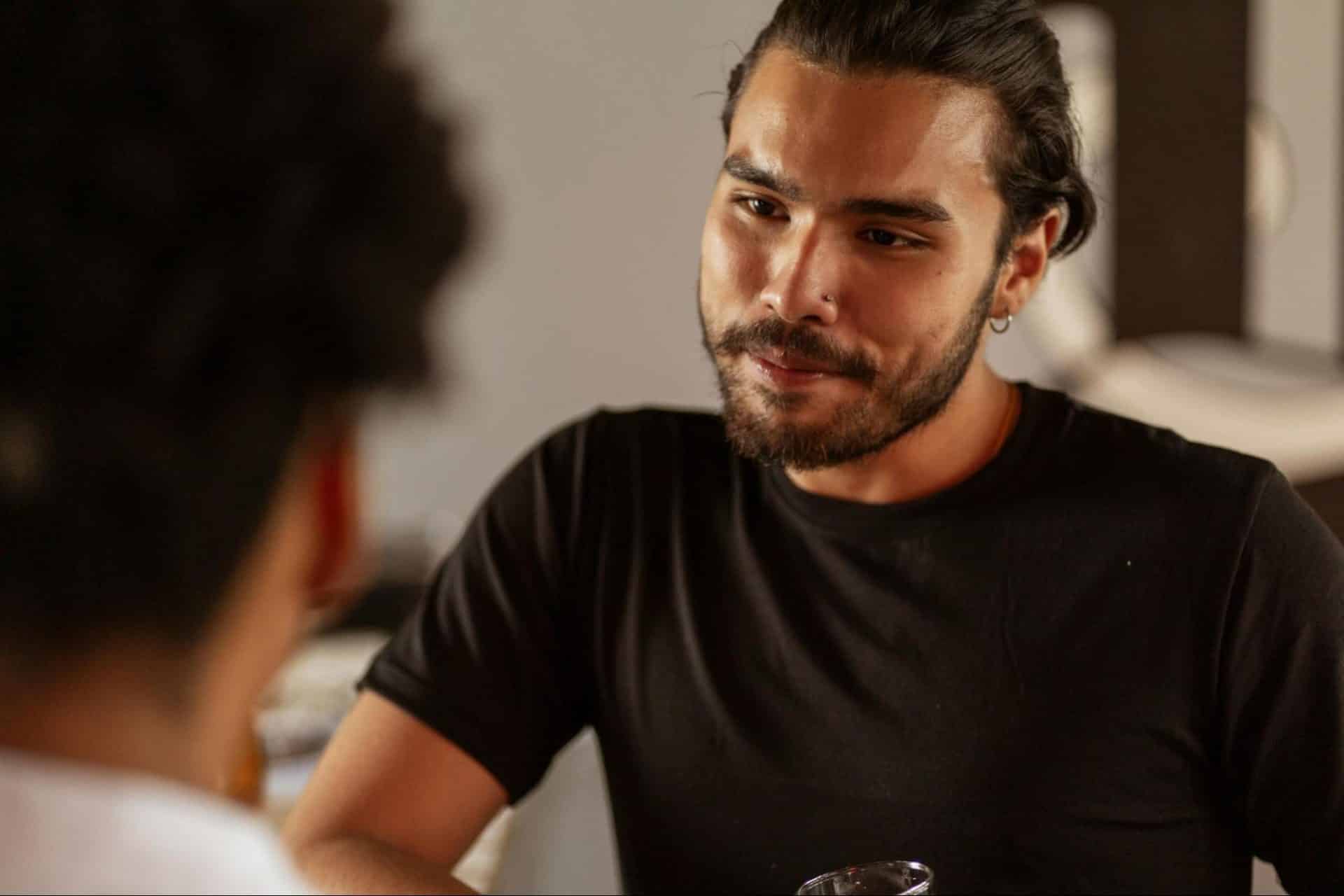 Man listening attentively during a conversation