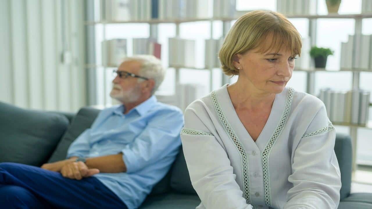 A couple looking sad after a fight