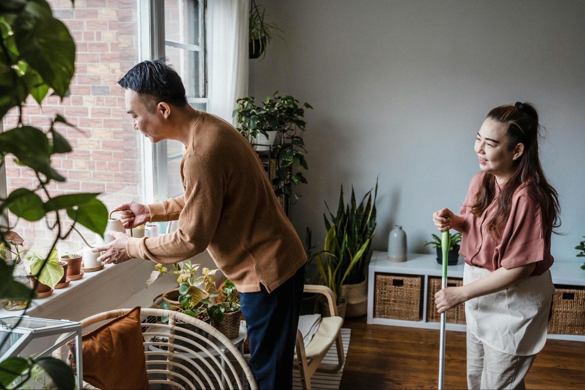 Couple casually doing tasks together at home without tension