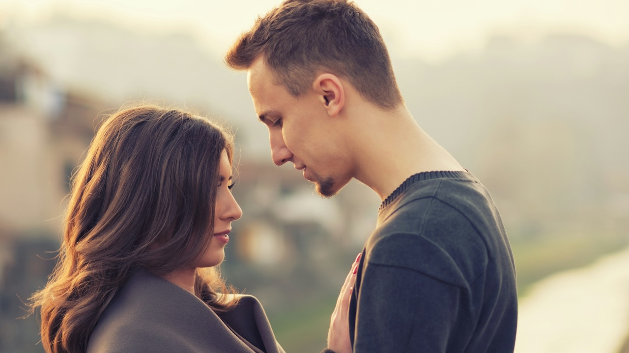 A man looking at a woman.