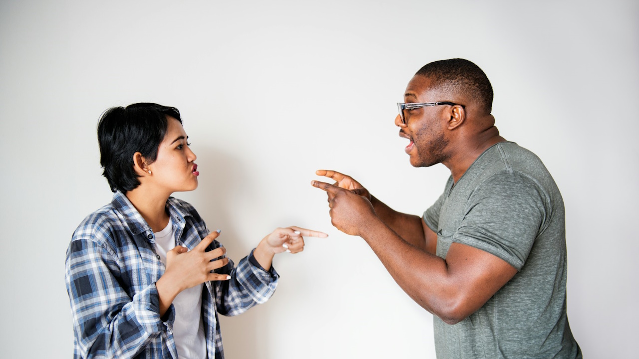 A man and a woman having an argument.