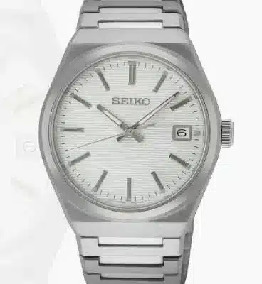Seiko SUR553 watch with white face and silver band and accents.